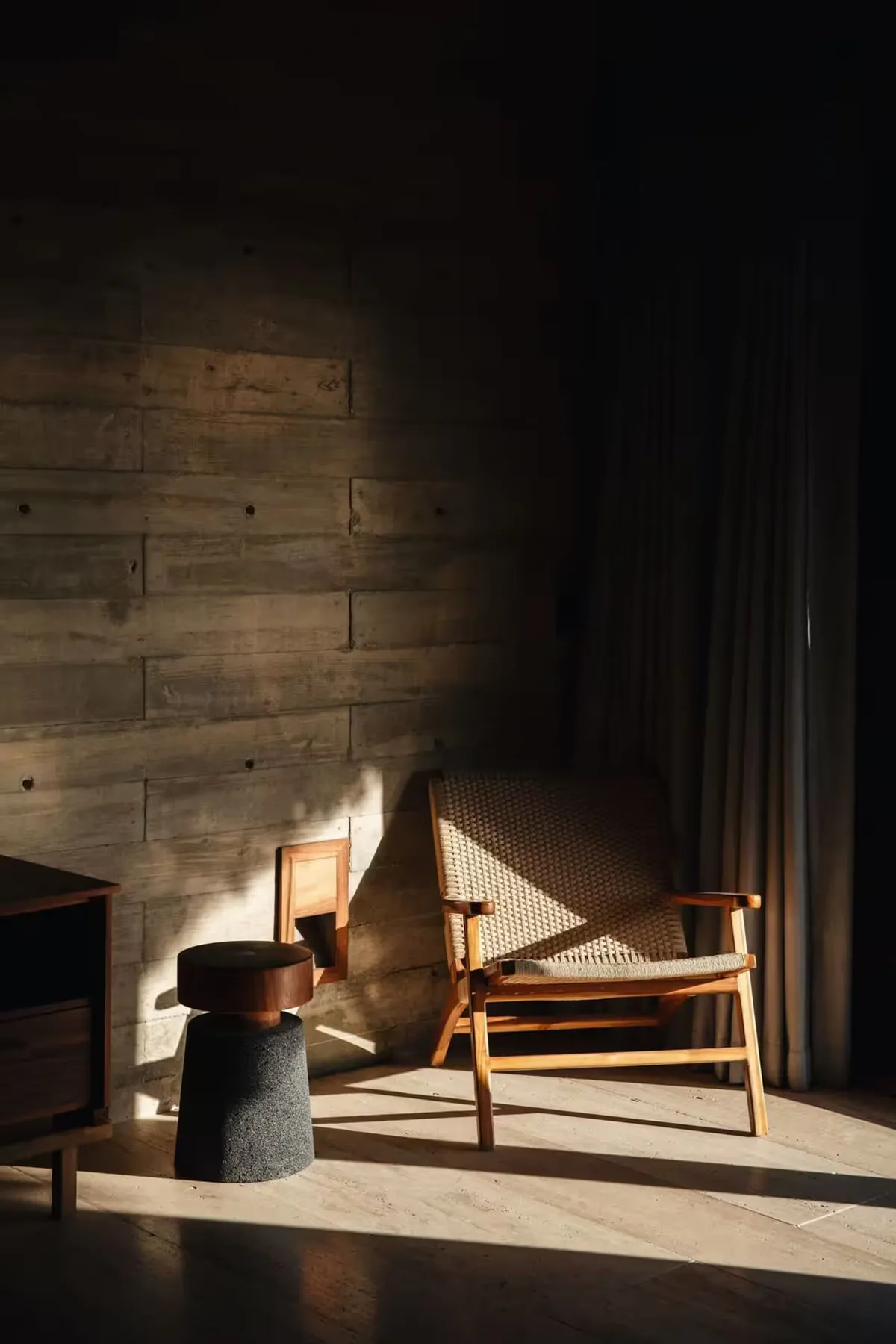 A sunlit reading chair in a Casita Homes property
